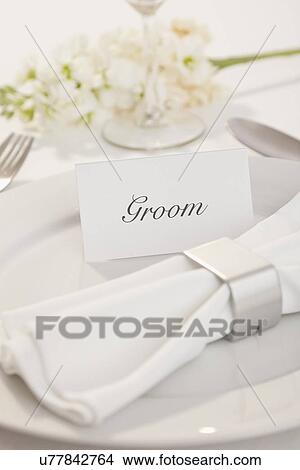Close-up of table setting for groom View Large Photo Image Picture - Close-up of table setting for groom. Fotosearch