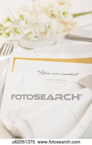 Close-up of wedding invitation on plate View Large Photo Image Stock Photography - Close-up of wedding invitation on plate. Fotosearch