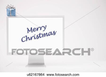 Computer monitor displaying merry Christmas phrase View Large Photo Image Picture - Computer monitor displaying merry Christmas phrase. Fotosearch