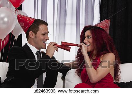 Couple celebrating birthday View Large Photo Image Stock Image - Couple celebrating birthday. Fotosearch