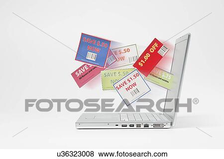Stock Photo - Coupons and laptop. Fotosearch
