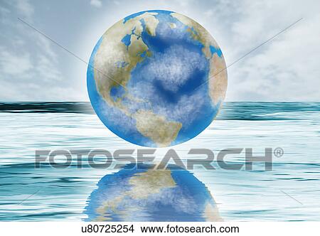 Picture - Digital image of planet Earth above sea. Fotosearch