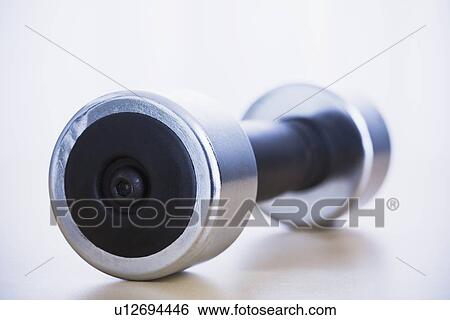 Stock Photograph - Dumbbell, Studio shot. Fotosearch