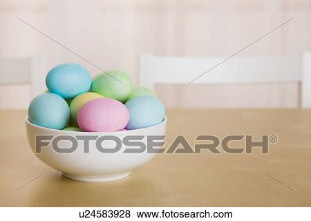 Easter eggs in bowl on table View Large Photo Image Stock Photo - Easter eggs in bowl on table. Fotosearch