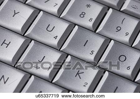 Extreme close-up of laptop keyboard View Large Photo Image Stock Photo - Extreme close-up of laptop keyboard. Fotosearch