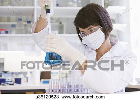 Female scientist doing research in laboratory View Large Photo Image Stock Image - Female scientist doing research in laboratory. Fotosearch