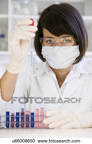 Female scientist doing research in laboratory, portrait View Large Photo Image Stock Image - Female scientist doing research in laboratory, portrait. Fotosearch