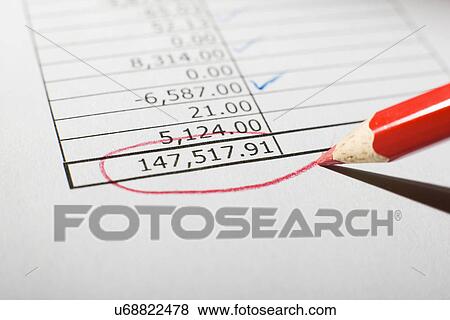 Financial figures marked by red pencil, close-up View Large Photo Image Stock Photo - Financial figures marked by red pencil, close-up. Fotosearch