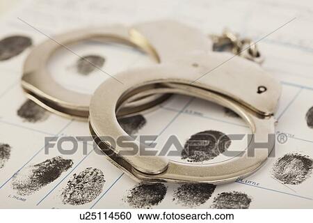 Fingerprints chart and handcuffs View Large Photo Image Stock Image - Fingerprints chart and handcuffs. Fotosearch