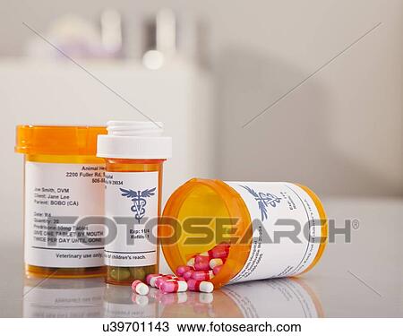Stock Image - Flasks with pills. Fotosearch