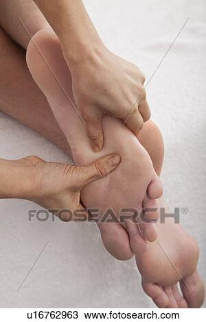 Foot massage, close-up View Large Photo Image Stock Image - Foot massage, close-up. Fotosearch