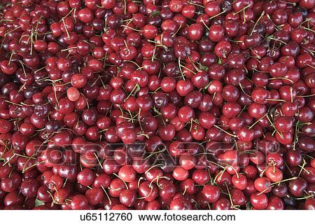 Stock Image - Fresh cherries, full frame. Fotosearch