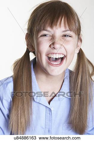 Girl laughing, portrait View Large Photo Image Stock Image - Girl laughing, portrait. Fotosearch