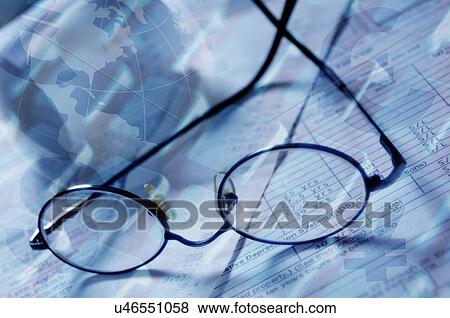 Stock Photo - Glasses and financial data. Fotosearch