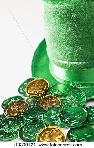Gold and green coins with irish shamrock symbol View Large Photo Image Picture - Gold and green coins with irish shamrock symbol. Fotosearch