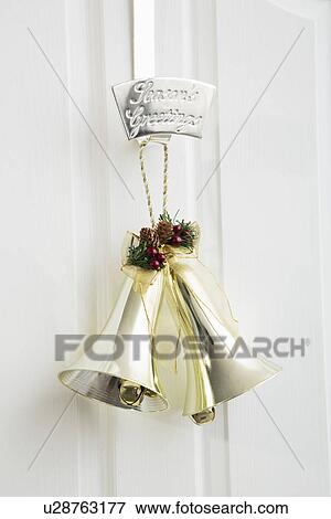 Golden Bells Hanging On Door Stock Photo U28763177 Fotosearch
