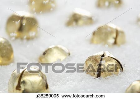 Golden jingle bells in snow View Large Photo Image Stock Photography - Golden jingle bells in snow. Fotosearch