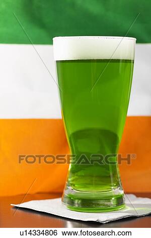 Green beer against Irish flag View Large Photo Image Stock Photograph - Green beer against Irish flag. Fotosearch