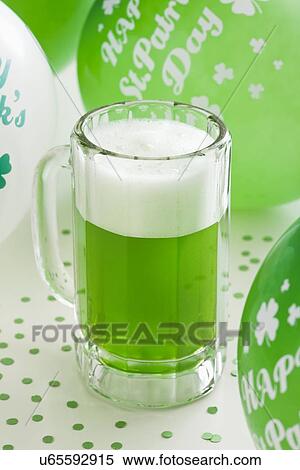 Green beer and balloons for celebrating St Patrick's Day View Large Photo Image Stock Photography - Green beer and balloons for celebrating St Patrick's Day. Fotosearch