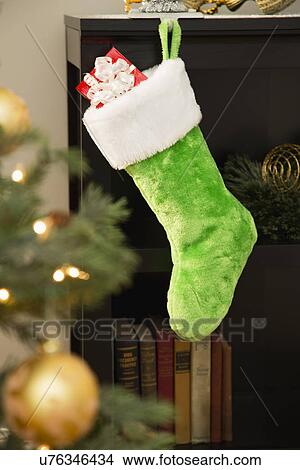 Green Christmas stocking View Large Photo Image Picture - Green Christmas stocking. Fotosearch