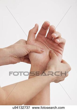 Stock Photo - Hand massage, close-up. Fotosearch
