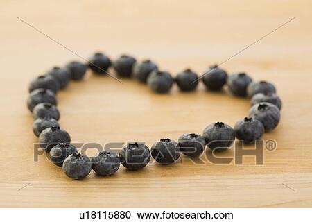 Stock Image - Heart of blueberries. Fotosearch