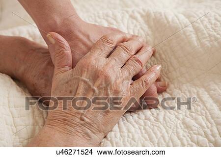 Holding hands View Large Photo Image Picture - Holding hands. Fotosearch