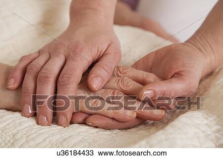 Holding hands View Large Photo Image Stock Image - Holding hands. Fotosearch