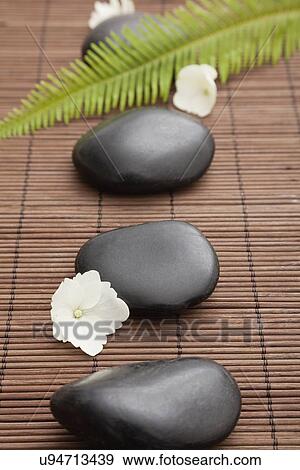 hot stone therapy stones in spa, Studio shot View Large Photo Image Stock Photo - hot stone therapy stones in spa, Studio shot. Fotosearch