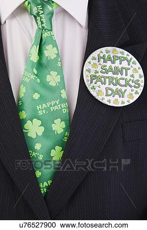 Stock Image - Man dressed for St. Patrick's Day, mid section. Fotosearch