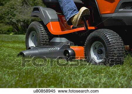 Man mowing lawn View Large Photo Image Stock Photography - Man mowing lawn. Fotosearch