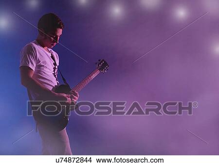Man playing electric guitar View Large Photo Image Picture - Man playing electric guitar. Fotosearch