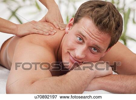Man receiving massage, close-up View Large Photo Image Stock Photo - Man receiving massage, close-up. Fotosearch