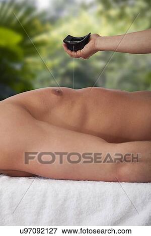 Man receiving massage, close-up View Large Photo Image Stock Photo - Man receiving massage, close-up. Fotosearch
