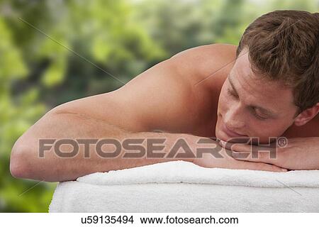Man resting in spa, close-up View Large Photo Image Picture - Man resting in spa, close-up. Fotosearch