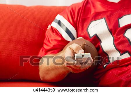 Man watching tv View Large Photo Image Stock Photo - Man watching tv. Fotosearch