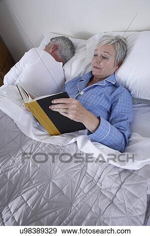 Mature couple in bed View Large Photo Image Stock Photo - Mature couple in bed. Fotosearch