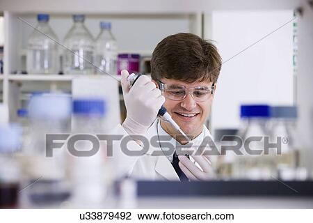 Mid adult scientist View Large Photo Image Stock Image - Mid adult scientist. Fotosearch