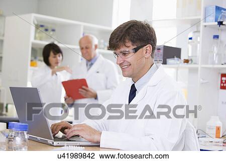 Mid adult scientist View Large Photo Image Stock Image - Mid adult scientist. Fotosearch