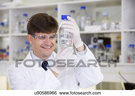 Mid adult scientist View Large Photo Image Stock Photograph - Mid adult scientist. Fotosearch
