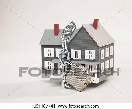 Model house in chains View Large Photo Image Stock Image - Model house in chains. Fotosearch