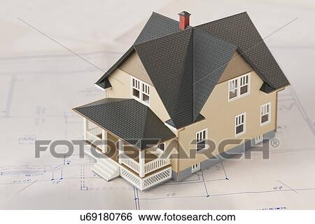 Model house on blueprint View Large Photo Image Stock Photograph - Model house on blueprint. Fotosearch