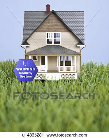 Model house on fake grass with warning security sign View Large Photo Image Stock Image - Model house on fake grass with warning security sign. Fotosearch
