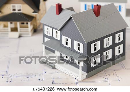 Model houses on blueprint View Large Photo Image Stock Photograph - Model houses on blueprint. Fotosearch