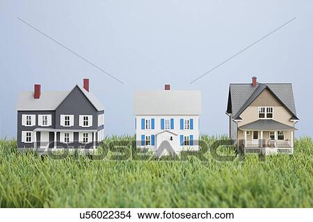 Picture - Model houses on fake grass. Fotosearch