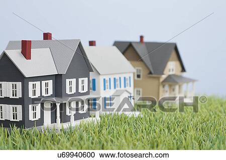 Model houses on fake grass View Large Photo Image Stock Image - Model houses on fake grass. Fotosearch