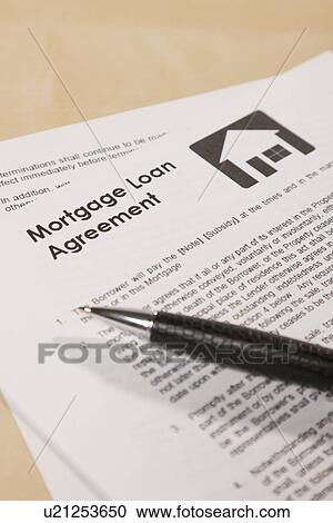 Stock Image - Mortgage document and pen. Fotosearch