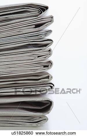 Newspaper stack on white background, close-up View Large Photo Image Stock Image - Newspaper stack on white background, close-up. Fotosearch