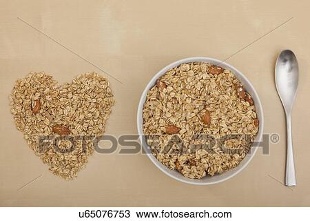 Oatmeal in heart shape View Large Photo Image Stock Image - Oatmeal in heart shape. Fotosearch