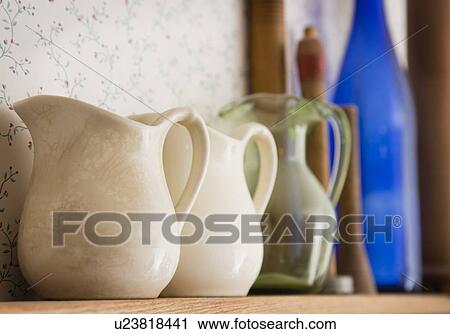 Old-fashioned jugs on shelf View Large Photo Image Stock Image - Old-fashioned jugs on shelf. Fotosearch